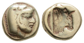 Greek, Lesbos, Mytilene. Electrum Hekte ca. 478-455 BC. 2.40gr. 10.3 mm.
Head of Herakles right, wearing lion's skin headdress.rev. Incuse head of bu...