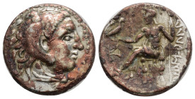Greek Kings of Macedon.. Alexander III "the Great" 336-323 BC. rachm AR, 16,6 mm., 4,15 g.
Head of Herakles right, wearing lion skin /Zeus seated lef...