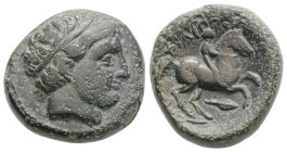 KINGS OF MACEDONIA, Philip II. Be17. (Ae. 6.g/17,5 mm). 359-336 BC (Seaby 6698) Obv: Diademed head of Apollo right. Rev: Philip II on horseback advanc...