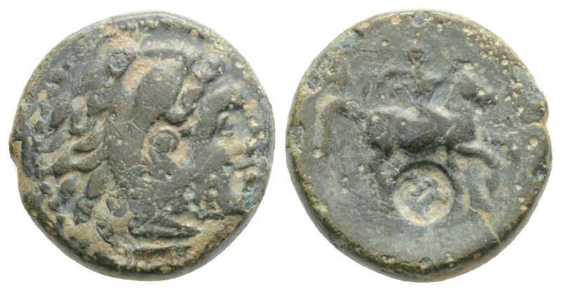 Kingdom of Macedon, Philip II Æ Circa 359-336 BC. Head of Herakles to right, wea...