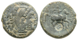 Kingdom of Macedon, Philip II Æ Circa 359-336 BC. Head of Herakles to right, wearing lion skin
headdress / ΦΙΛΙΠΠΟΥ, warrior on horse rearing to righ...