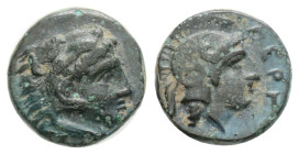 Greek, Mysia, Pergamon. ca. 310-284 B.C. AE 0,82 g. 9,4 mm. Head of Herakles right, wearing lion's skin headdress / ΠEP, Helmeted head of Athena right...