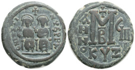 Byzantine, Justin II (565-578). Kyzikos. AE Follis (25,1 mm 13.2 g)
Obv: D N IVSTINVS P P A. Justin, holding globus cruciger, and Sophia, holding cru...