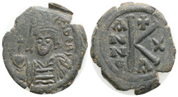 Byzantine
Maurice Tiberius. A.D. 582-602. AE half follis (15 mm, 6,66 g, 6 h). Constantinople mint, year 11 = A.D. 592/593. D N MAVR TIBER PP AV, hel...
