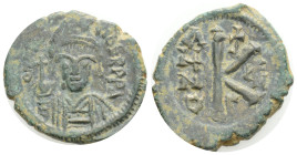 Byzantine coins, Maurice Tiberius, 582 - 602 AD. AE Half follis. Theopolis (Antioch) mint. 5. g. 24 mm. Obverse: bust facing, crown with trefoil ornam...