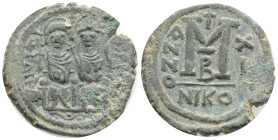 BYZANTINE 
Justine II, 565-578. AE-Follis 575/576 (= year 11) Nicomedia, 2nd office Obv.: D N IVSTI-NVS PP A (!), Justinus and Sophia enthroned v. v....