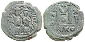 Justin II and Sophia AD 565-578. Nikomedia Follis or 40 Nummi Æ, 30,8 mm, 13,4 g
D N IVSTI-NVS P P, Justin and Sophia, both nimbate, enthroned facing...