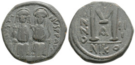 Justin II, with Sophia, Æ 40 Nummi. Nicomedia, dated RY 2 = AD 566/7. D N IVSTINVS P P ΛVG, Justin II and Sophia enthroned facing, cross between heads...