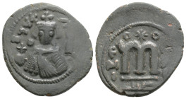 ISLAMIC. Arab-Byzantine (Circa 685-692). 4,2 g. 22,6 mm. Fals. Hims (Emesa).
Obv: Crowned and draped imperial bust facing, holding globus cruciger. R...