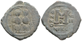 JUSTIN II with SOPHIA (565-578). Follis. Nicomedia. Dated RY 5 (569/70). 15 g. 33,6 mm.
Obv: D N IVSTINVS P P AVG. Justin, holding globus cruciger, a...