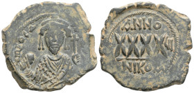 Phocas, 602-610. Follis (Bronze, 33,2 mm, 14.4 g, 7 h), Nicomedia, RY 3 = AD 604/5. [δ N FOCAS] PER AVς Crowned bust of Phocas facing, wearing consula...
