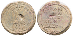 BYZANTINE LEAD SEAL. 12,4 g. 27,3 mm.
Obv: Nimbate bust of Saint. Rev: Legend in five lines.