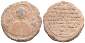 BYZANTINE LEAD SEAL, AD 1100-1200. 26,7 g. 32,8 mm.