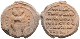 BYZANTINE LEAD SEALS. Nikephoros (Nikephoritzes), 29,3 g. 36,3 mm. Sebastophoros, Doux of Antioch (AD 1062-1063 or 1067).
Obv: St. Peter standing rig...