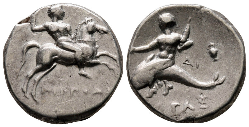 Calabria, Tarentum, 272 - 240 BC
Silver Nomos, 20mm, 6.48 grams
Obverse: Warri...