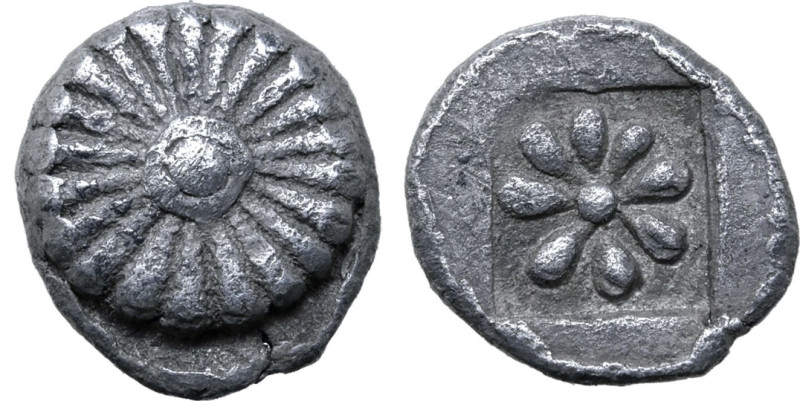 Ionia, Erythrai, 480 - 450 BC
Silver Hemiobol, 6mm, 0.31 grams
Obverse: Facing...