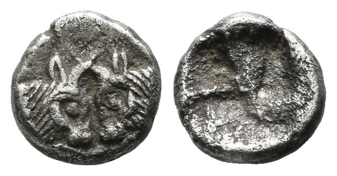 Caria, Uncertain. 5th century BC. AR Hemiobol (7mm, 0.58g). Foreparts of two con...