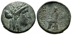 Ionia, Smyrna. Circa 2nd-1st centruies BC. AE (20mm, 6.30g). Laureate head of Apollo right / The poet Homer seated left, holding scroll.
