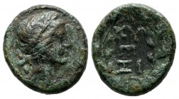 Mysia, Kyzikos. Circa 2nd-1st century BC. AE (17mm, 4.71g). Head of Kore Soteira right, wearing wreath of grain. / KY - ΞI and Monogram; all within wr...