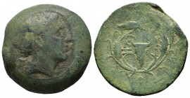 Mysia, Kyzikos. Circa 3rd century BC. AE (22mm, 15.99g). Wreathed head of Kore Soteira right / Bucranium; monogram above; all within wreath of grain e...