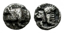 Mysia, Kyzikos. Circa 525-475 BC. AR Tetartemorion (4mm, 0.18g). Forepart of boar left; tunny to right / Head of roaring lion left; K to upper left; a...