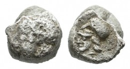 Mysia, Lampsakos. Circa 500-450 BC. AR Hemitetartemorion (5mm, 0.16g). Head possibly of Apollo left / Head of Athena left, wearing Corinthian helmet. ...