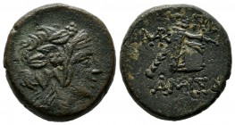 Pontos, Amisos. Ca. 85-65 BC. AE (20mm, 9.13g). Head of youthful Dionysos right, wreathed with ivy / AMIΣOY, Cista mystica with panther skin, diadem a...