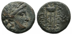 Seleukid Kingdom. Antiochos II Theos, 261-246 BC. AE (15mm, 4.34g). Laureate head of Apollo right / BAΣΙΛΕΩΣ ANTIOXOY, to right and left of tripod. YO...