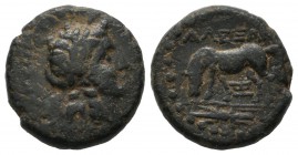 Troas, Alexandreia. Circa 3rd-2nd centuries BC. AE (15mm, 3.79g). Laureate head of Apollo right / Horse grazing left; monogram below, thunderbolt in e...