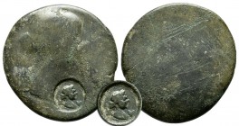 Faustina or Crispina, 2nd. century AD. AE (25mm, 8.17g). Uncertain mint. Inscription illegible. Outline of imperial bust right; countermark at lower r...