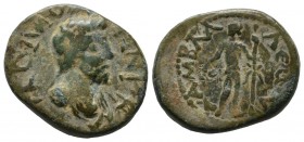 Pisidia, Amblada. Commodus, 176-192 AD. AE (21mm, 5.48g). Laureate and cuirassed bust right. / ΑΜΒΛΑΔƐωΝ, Dionysos standing left, holding kantharos an...