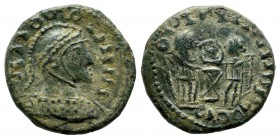 Barbarous Imitation. Circa 4th century AD. AE (17mm, 3.08g). Barbarous mint. Crude legends, helmeted and cuirassed bust right / Two Victories placing ...