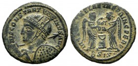 Constantine I. AD 319. AE Nummus (19mm, 2.86g). Siscia. IMP CONSTANTINVS AVG, cuirassed bust left, wearing high-crested helmet, holding spear across r...