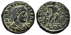Gratian, AD 367-383. AE (17mm, 2.17g). Siscia mint, 3rd officina. Struck AD 367-375. Pearl-diademed, draped, and cuirassed bust right / Emperor advanc...