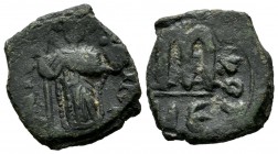 Constans II. 641-668 AD. AE Follis (19mm, 4.80g). Constans standing facing, wearing crown topped with cross and chlamys, holding long cross and globus...