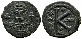 Justinian I. 527-565 AD. AE 20 Nummi - Half Follis (26mm, 9.06g), Theoupolis (Antioch) mint. Dated RY 23. Helmeted, pearl-diademed and cuirassed bust ...