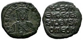 Leo VI the Wise, 886-912 AD. AE Follis (22mm, 5.16g). Constantinople. +LEON bAS-ILEVS ROM, crowned bust facing with short beard, wearing chlamys, hold...