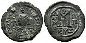 Maurice Tiberius, 582-602 AD. AE Follis - 40 Nummi (30mm, 11.61g). Cyzicus mint, 2nd officina. Dated RY 4 (586/7). D N mAVRIC TIbER P P A, Crowned and...