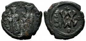 Phocas, with Leontia, 602-610 AD. AE Half Follis - 20 Nummi (20mm, 5.78g). Theoupolis (Antioch) mint. DN FOCA NE PE AV, Phocas standing facing on left...