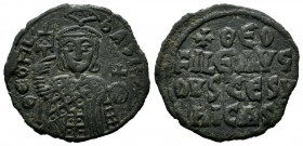 Theophilus (829-842). AE Follis (22mm, 2.84g). Constantinople. ΘЄOFIL ЬASIL. Half-length figure facing, holding labarum and globus cruciger, and weari...