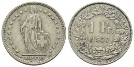 Switzerland, 1964 Silver 1 Franc, KM #24 | Designer: A.Bovy. Standing Helvetia with lance and shield within star border; HELVETIA below. 1 Fr. 1957 wi...
