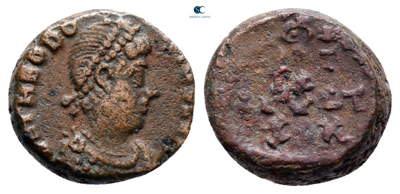 Theodosius I AD 379-395. Uncertain mint
Follis Æ

11 mm, 1,63 g



very f...