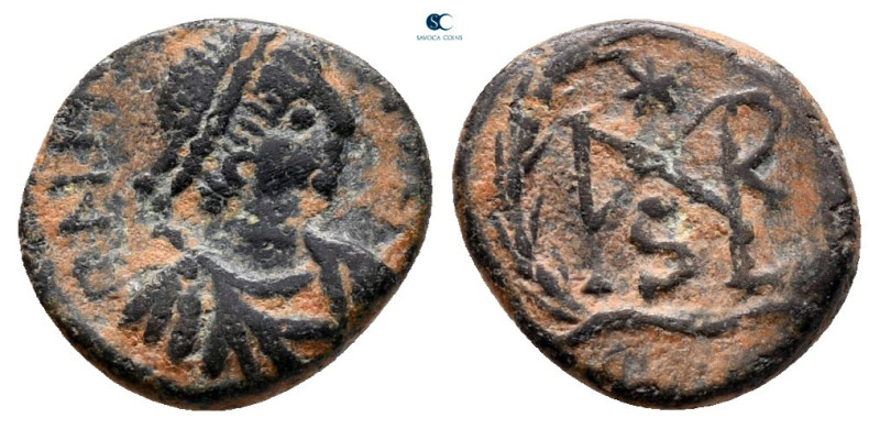 Marcian AD 450-457. Constantinople
Nummus Æ

11 mm, 0,89 g



very fine