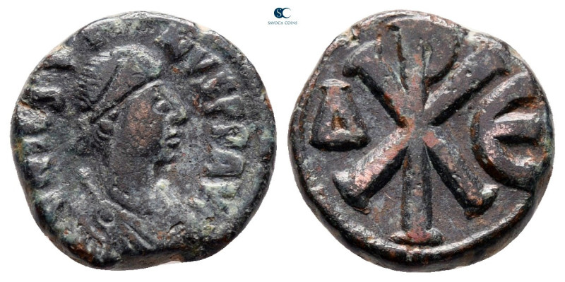 Justin I AD 518-527. Constantinople
Pentanummium Æ

14 mm, 2,09 g



very...