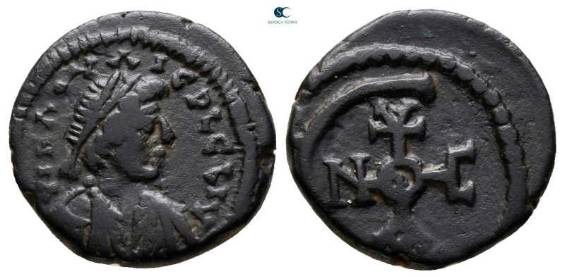 Justinian I AD 527-565. Theoupolis (Antioch)
Pentanummium Æ

14 mm, 1,68 g
...