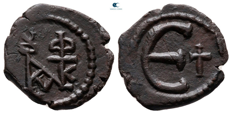 Justin II AD 565-578. Theoupolis (Antioch)
Pentanummium Æ

16 mm, 1,63 g

...
