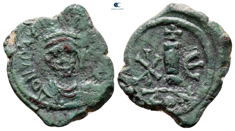 Maurice Tiberius AD 582-602. Constantinople
Decanummium Æ

20 mm, 3,28 g

...