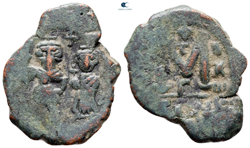 Heraclius with Heraclius Constantine AD 610-641. Constantinople
Follis Æ

28 ...