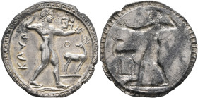 BRUTTIUM. Kaulonia. Circa 525-500 BC. Nomos (Silver, 29 mm, 7.34 g, 12 h). KAYΛ Apollo, nude, striding right, holding laurel branch in his upraised ri...