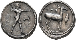 BRUTTIUM. Kaulonia. Circa 475-425 BC. Didrachm or Nomos (Silver, 18 mm, 7.76 g, 12 h). KAVΛ Apollo, nude, advancing right, holding laurel branch in hi...